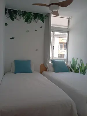 Cama o camas de una habitación en De casa al mar