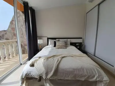 Cama o camas de una habitación en Ocean Apartment Tauro, Fast WI-FI, Pool, Terrace