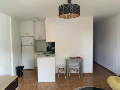 Una cocina o zona de cocina en Playa del Ingles - GT near Yumbo