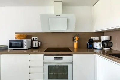 Una cocina o zona de cocina en Playa del Ingles - Paraiso