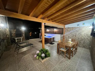 Zona de estar de Casa Amelia - con Spa de hidromasaje