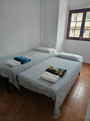 Cama o camas de una habitación en V.V. familiar