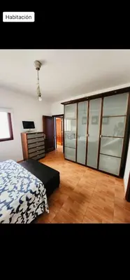 Cama o camas de una habitación en V.V. familiar