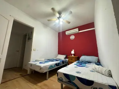 Cama o camas de una habitación en La casita de Ángela
