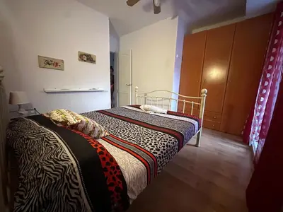 Cama o camas de una habitación en La casita de Ángela