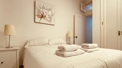Cama o camas de una habitación en Click&Guest - Las Canteras Rose