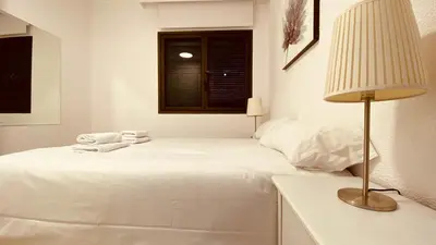 Cama o camas de una habitación en Click&Guest - Las Canteras Rose