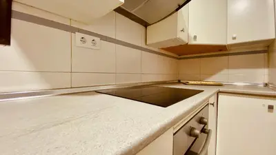 Una cocina o zona de cocina en Click&Guest - Las Canteras Rose