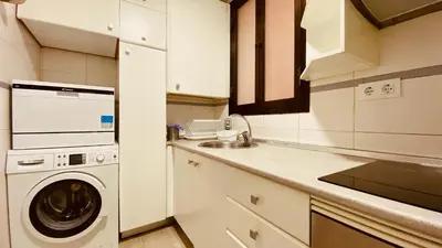 Una cocina o zona de cocina en Click&Guest - Las Canteras Rose