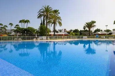 Piscina en o cerca de Villa Guerrero - Terraza y acceso a piscina común