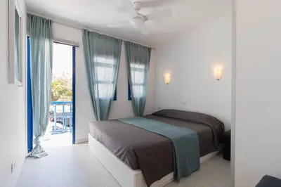 Cama o camas de una habitación en CASA RIMIDIA