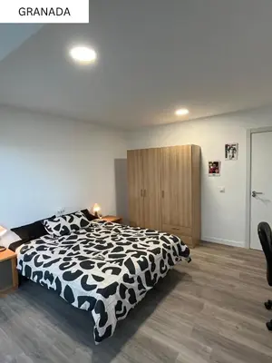 Cama o camas de una habitación en CoLiving El Juan