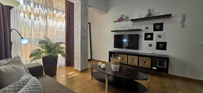 Una televisión o centro de entretenimiento en JM18 Beach by Wave Properties