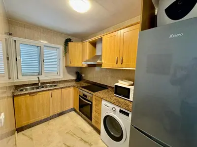 Una cocina o zona de cocina en Deluxe Ciudad Jardin - by Gestión Vacacional Canarias