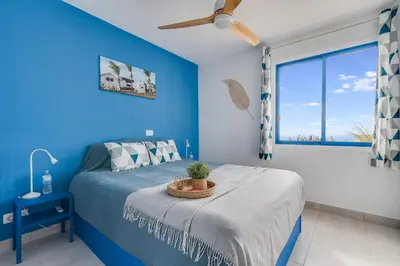 Cama o camas de una habitación en Corona Rosa Ocean View