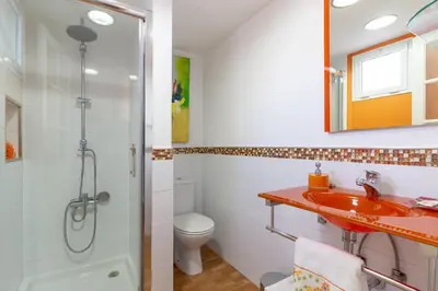 Un baño de Villa Martina