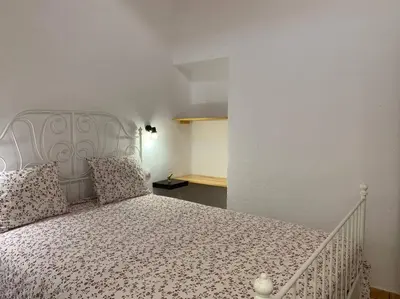 Cama o camas de una habitación en Tasarte. Casa adosada. Berajot 7b.