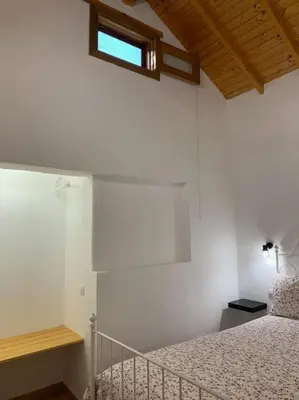 Cama o camas de una habitación en Tasarte. Casa adosada. Berajot 7b.
