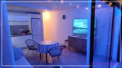 Una televisión o centro de entretenimiento en Ocean Apartment Gran Canaria