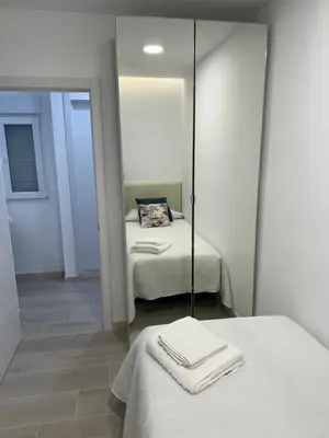 Cama o camas de una habitación en Ático Vistas Mar Playa Las Canteras