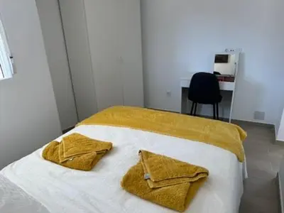 Cama o camas de una habitación en Apartamentos Casa Mime