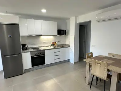 Una cocina o zona de cocina en Apartamentos Casa Mime