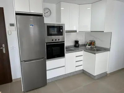 Una cocina o zona de cocina en Apartamentos Casa Mime