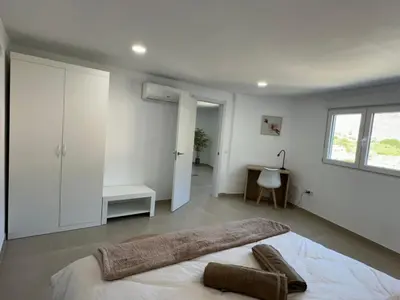 Cama o camas de una habitación en Apartamentos Casa Mime