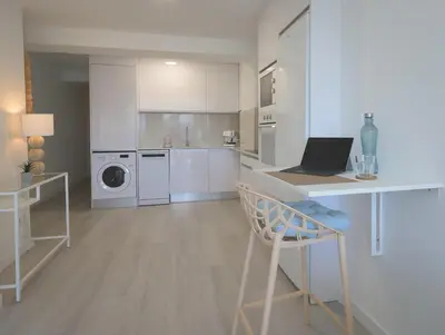 Una cocina o zona de cocina en Relax Las Canteras Isleta