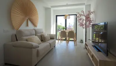 Una televisión o centro de entretenimiento en Relax Las Canteras Isleta