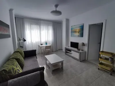 Una televisión o centro de entretenimiento en Apartamento Brisa Marina