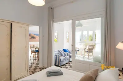 Cama o camas de una habitación en Living Las Canteras Homes - SOUTH FACING & PARKING