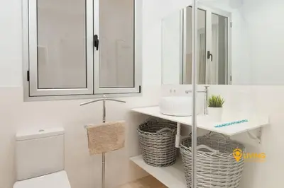 Un baño de Living Las Canteras Homes - SOUTH FACING & PARKING