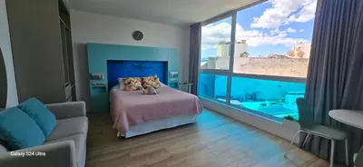 Cama o camas de una habitación en Edison - Las Canteras