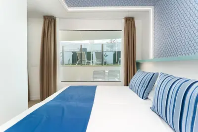Cama o camas de una habitación en Alsol Los Caribes 2 - Adults Only