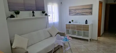 Zona de estar de Vivienda vacacional a 10 minutos de la capital.