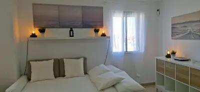 Cama o camas de una habitación en Vivienda vacacional a 10 minutos de la capital.