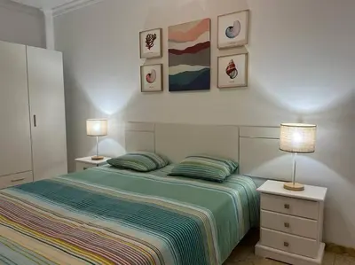 Cama o camas de una habitación en Pieds dans l'eau - vue sur mer - Playa de Melenara