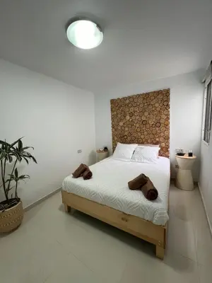 Cama o camas de una habitación en Playa del Hombre Deluxe Luxury Apartments