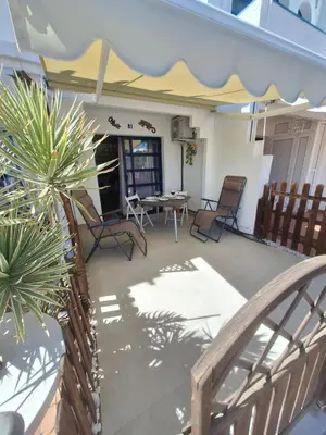 Un balcón o terraza de POOLFRONT Bungalow