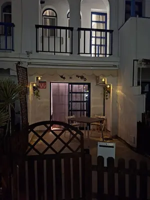 Un balcón o terraza de POOLFRONT Bungalow
