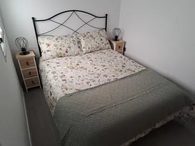 Cama o camas de una habitación en Terraza Sol y Niebla