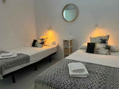 Cama o camas de una habitación en Casa Adamar Vibbecanarias, Puerto Rico