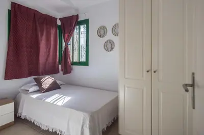 Cama o camas de una habitación en GuestReady - Las Palomas 48