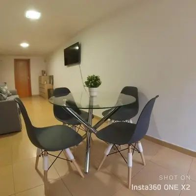 Una televisión o centro de entretenimiento en Apartamento Calidad - playa - paseos-Servicios