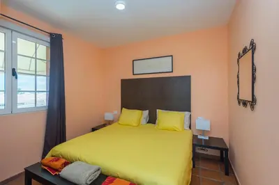 Cama o camas de una habitación en Villa Montaña Negra III