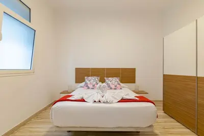 Cama o camas de una habitación en Padilla 56