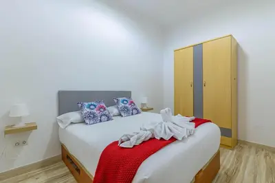 Cama o camas de una habitación en Padilla 56