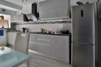 Una cocina o zona de cocina en GARDEN HOUSE
