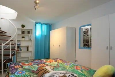 Cama o camas de una habitación en GARDEN HOUSE